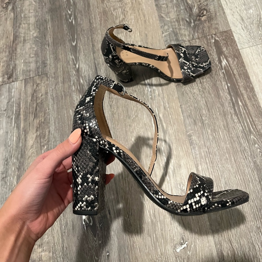 Black snakeskin heels